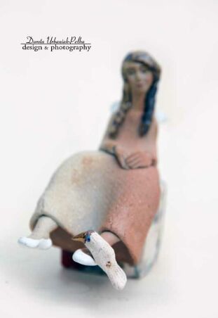 ANIOŁ NA KOSTCE Z PTAKIEM