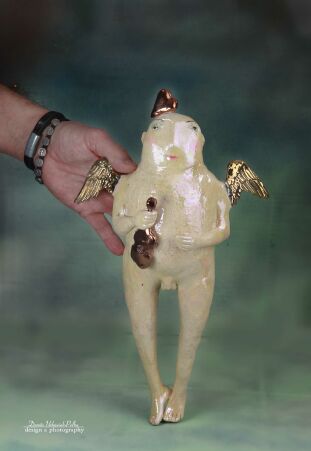 ZŁOTOSKRZYDŁY Z MIEDZIANYM SERCEM I SKRZYPCAMI PUSZCZA OKO