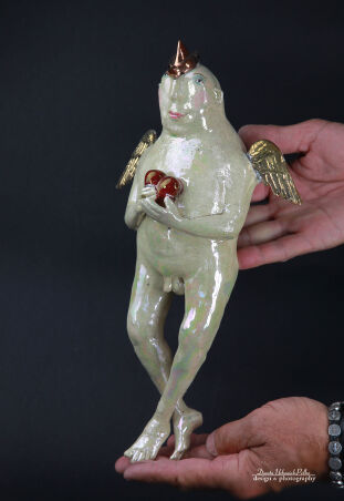 ZŁOTOSKRZYDŁY Z SERCEM NA DŁONI  PUSZCZA OKO