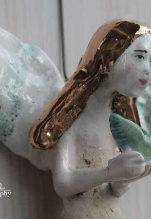 ZŁOTOWŁOSY Z PTAKIEM