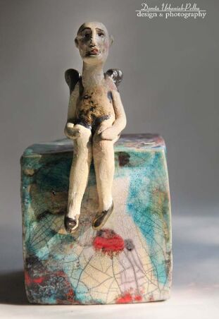 ANIOŁEK NA KOSTCE RAKU